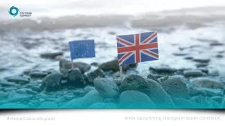 EU and UK flag on a beach